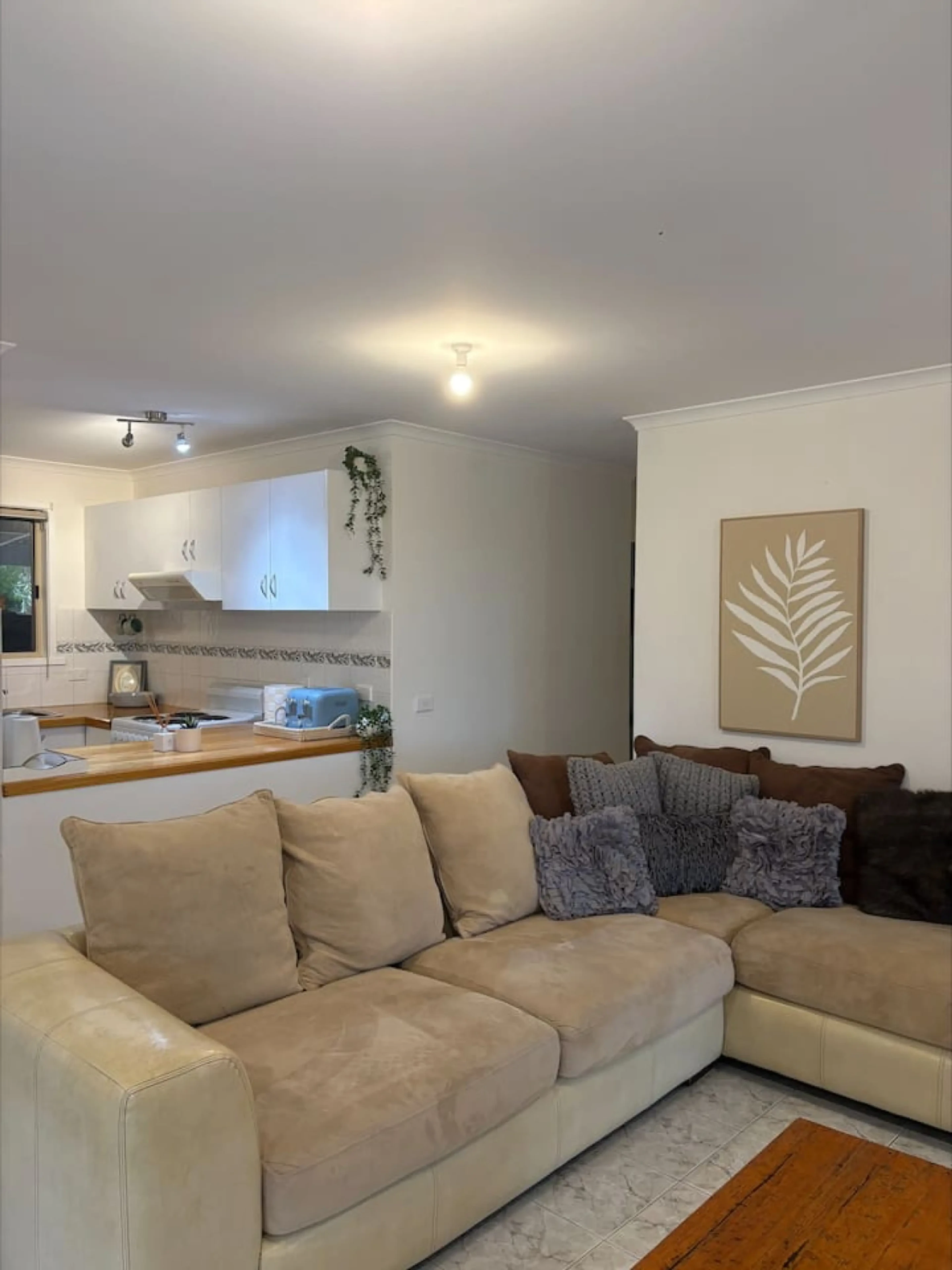 Pine Lea Lodge living room with kitchen view