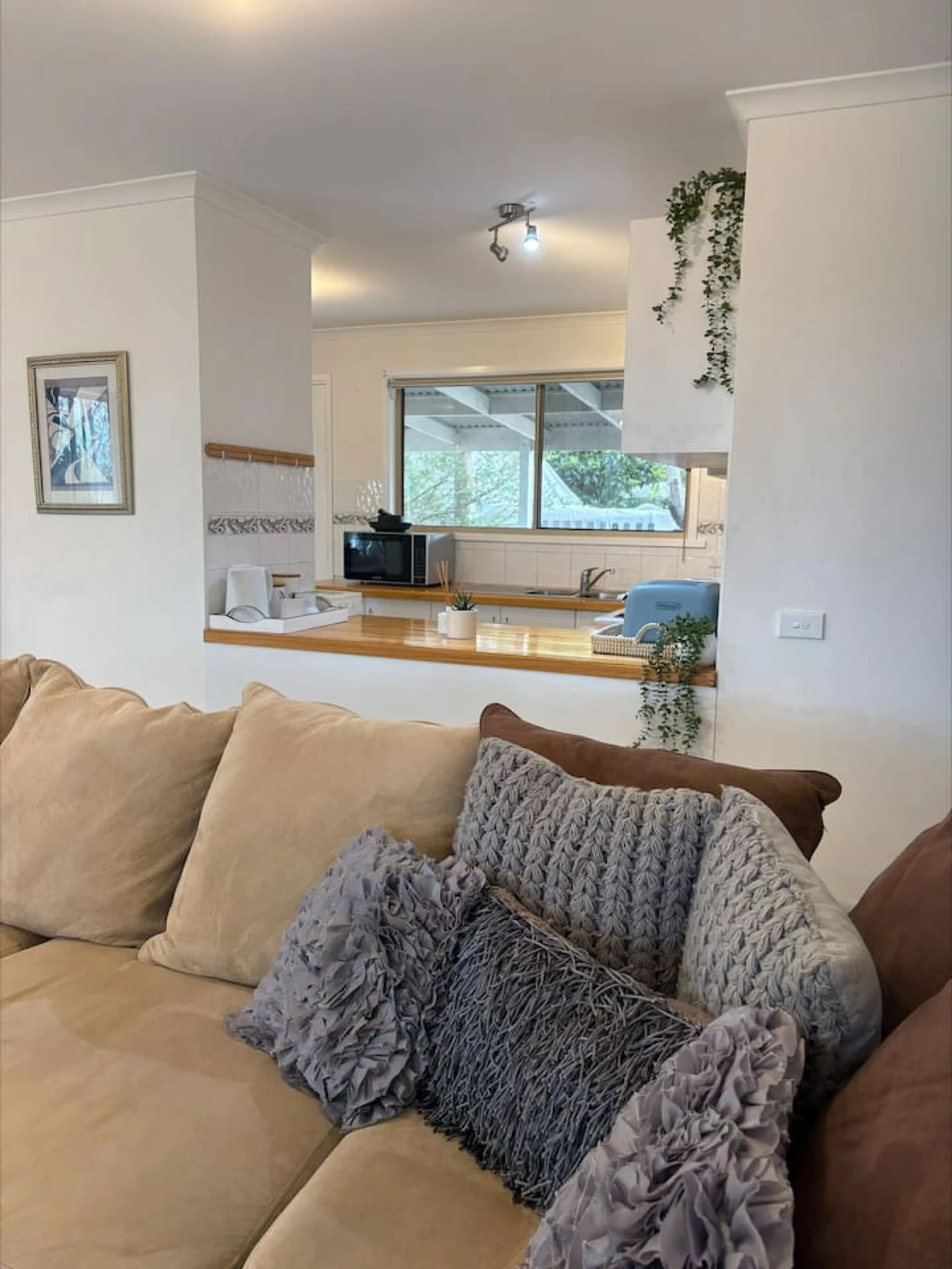 Pine Lea Lodge living room with kitchen pass-through