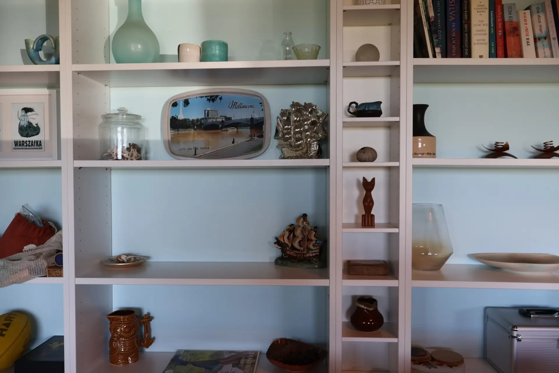 Far View built-in shelving with curios, books and Melbourne memorabilia