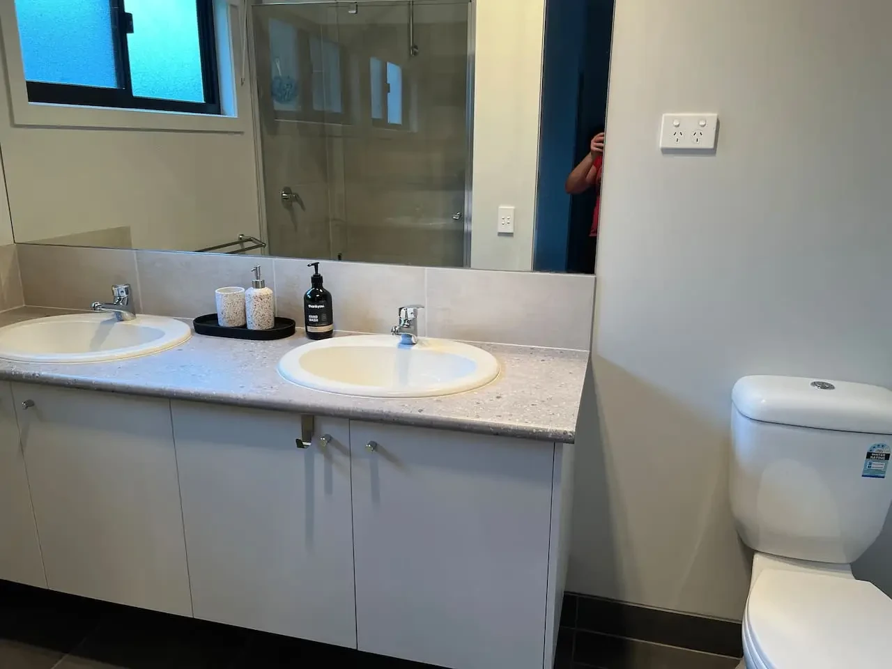 Hakuna Matata bathroom with double vanity and shower