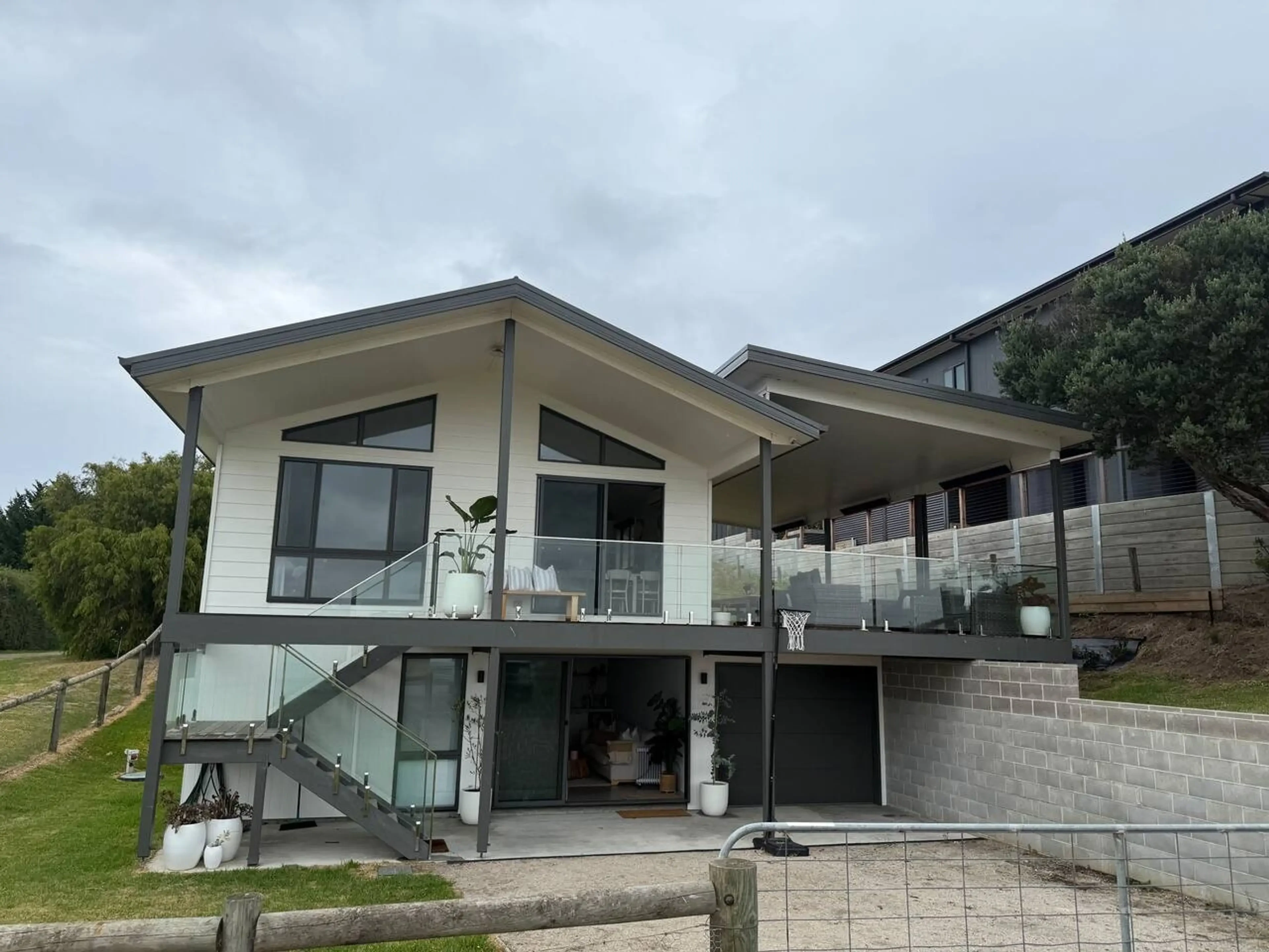 Lancaster Lodge exterior front view with glass deck railing