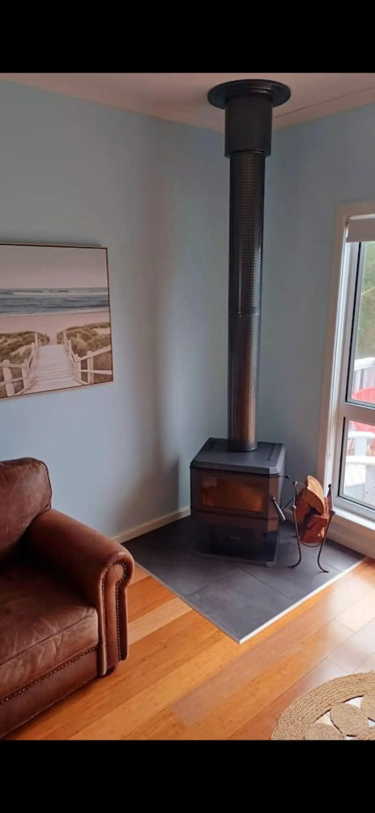 Ocean Blue — wood fire heater in living room