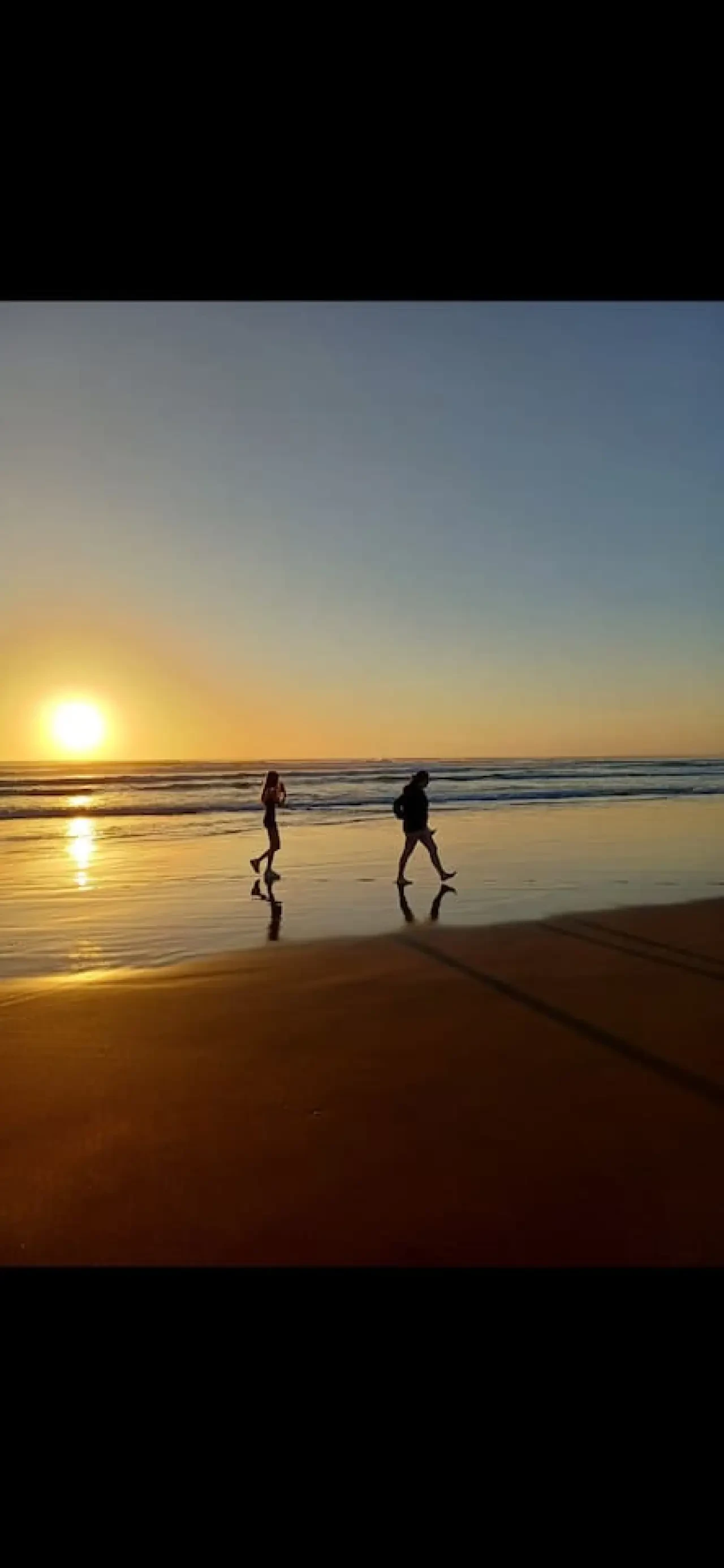 Ocean Blue — sunset walk on the beach