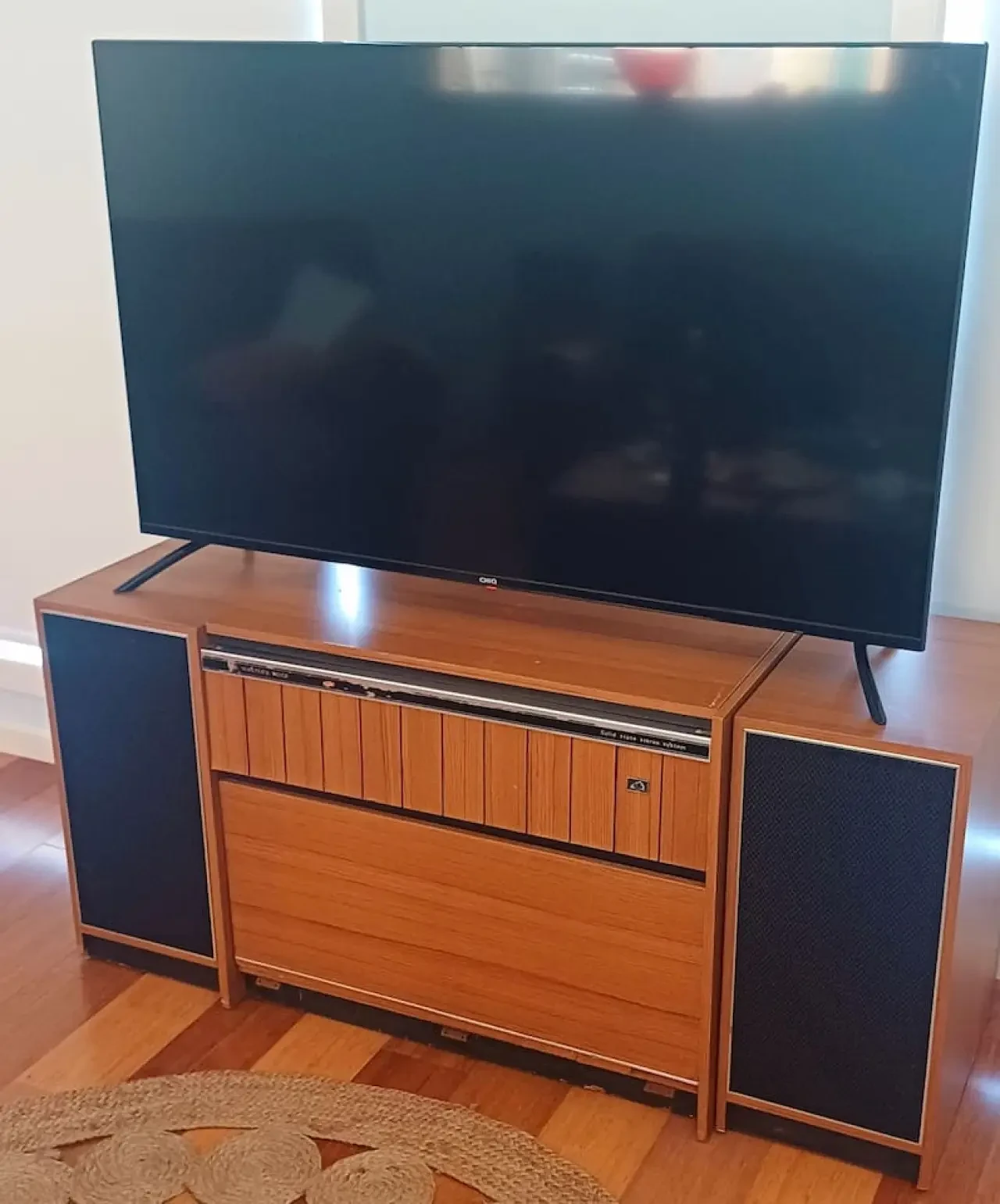 Ocean Blue — vintage wooden TV console with large flat screen