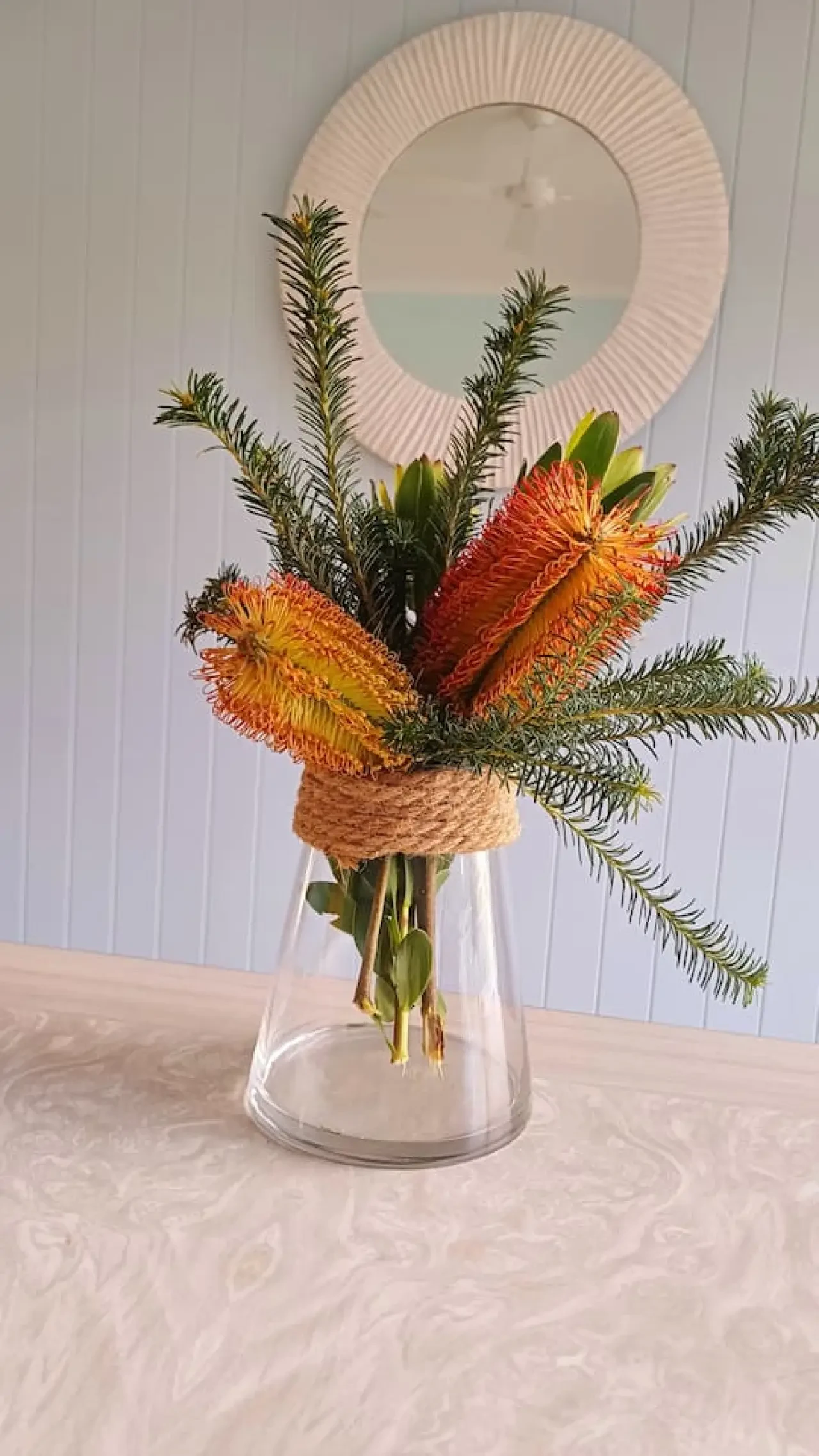 Ocean Blue — native banksia flowers in rope-wrapped glass vase