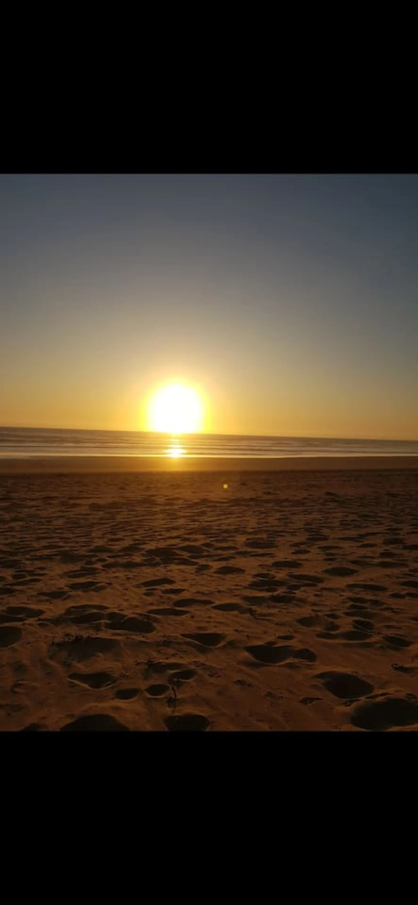 Ocean Blue — golden sunset over Venus Bay beach
