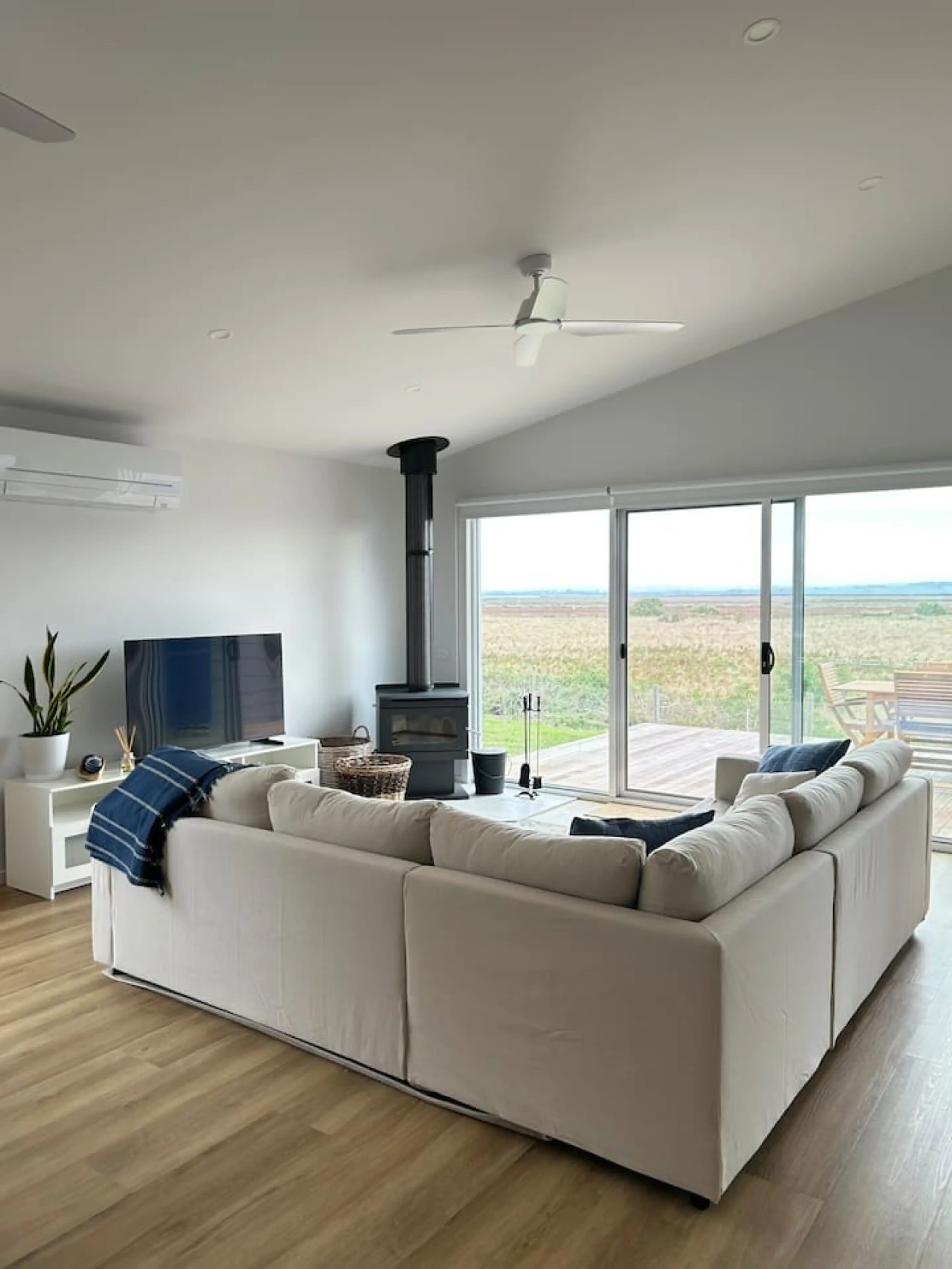 Roo Views open plan living room with coastal views