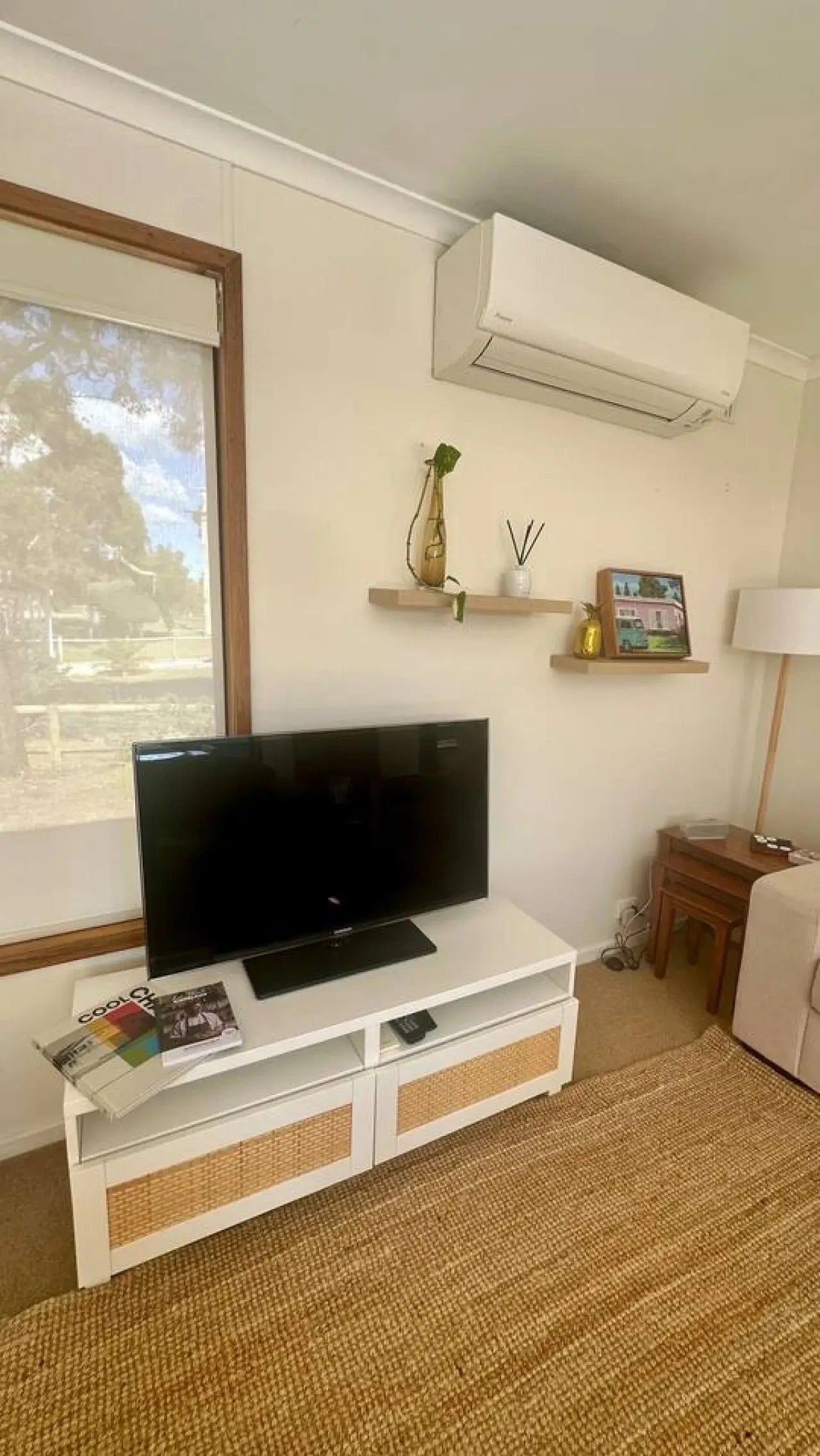 The Deck @ VB - living room with TV and air con