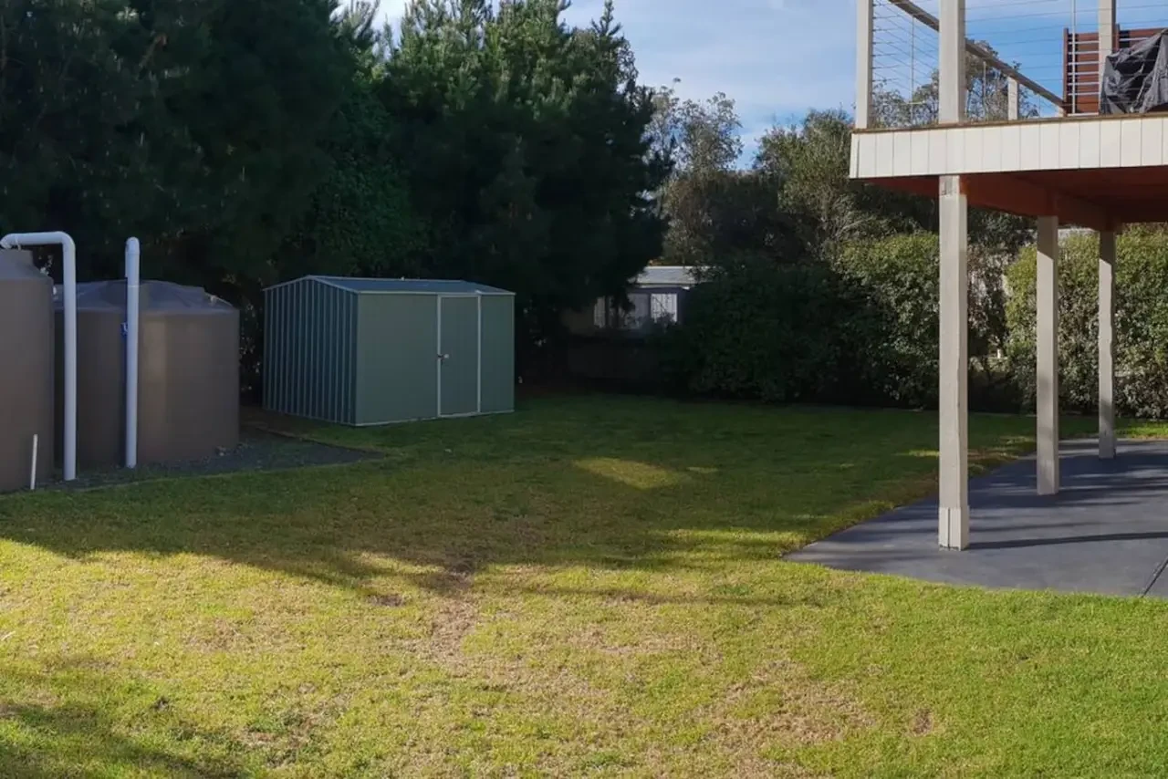 Venus Haven backyard with shed and deck