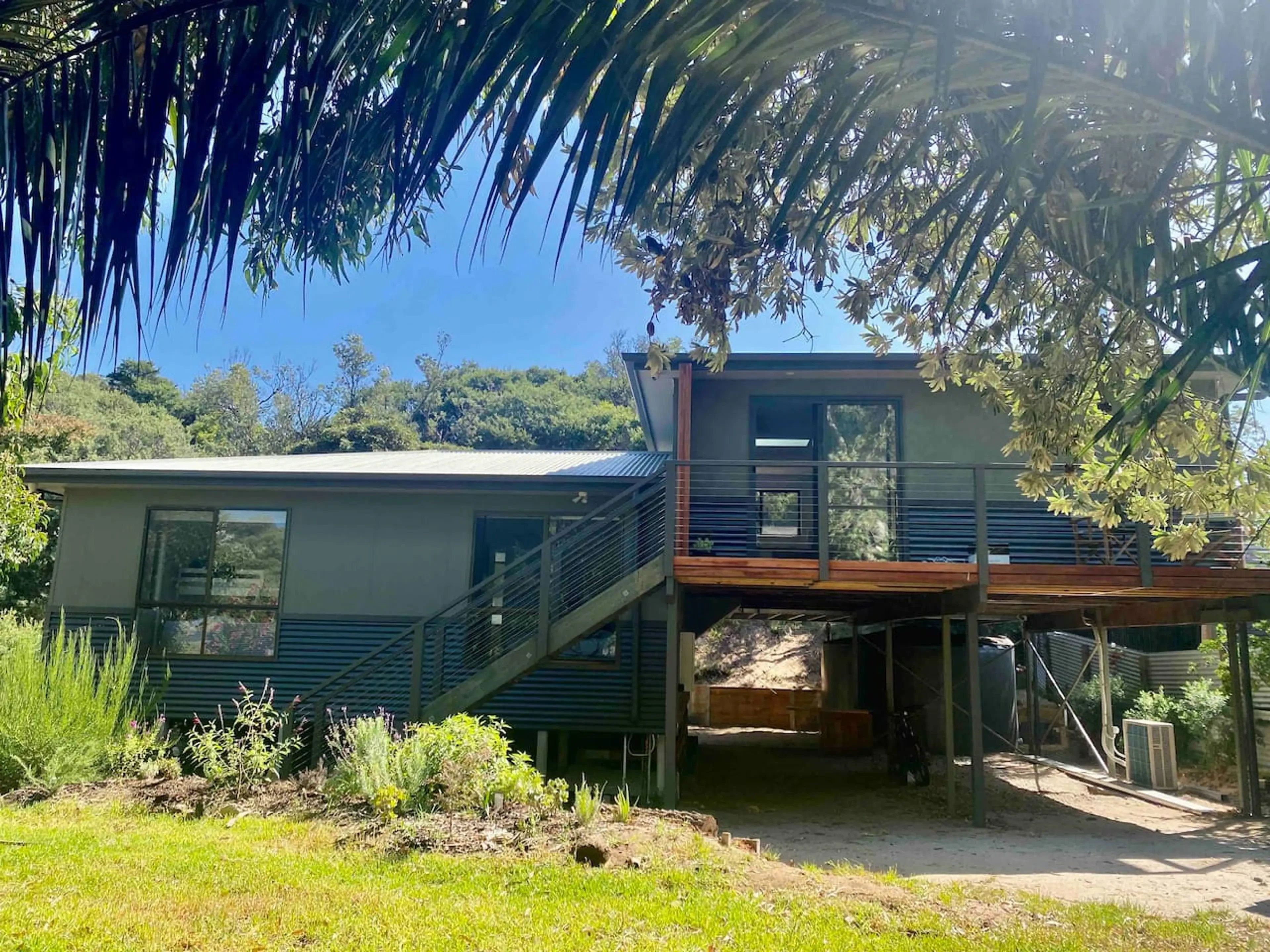 Witjweri exterior with elevated deck and native surrounds