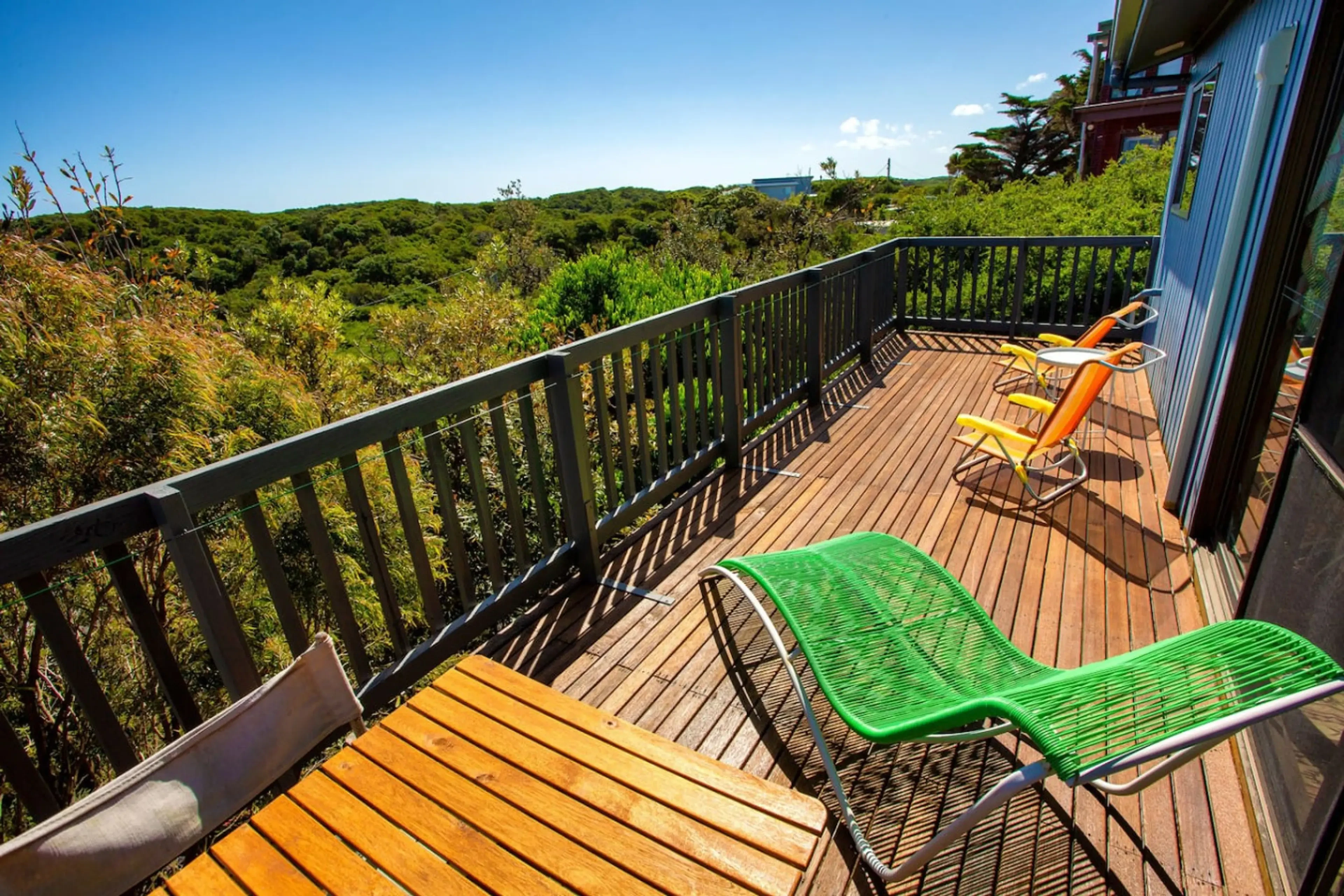 Retro Dunes deck overlooking lush green valley